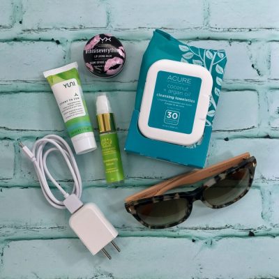 travel products, iPhone charger, sunglasses, nyx lip loving balm, acute cleansing towelettes, yuni count to zen, Tata harper rejuvenating serum
