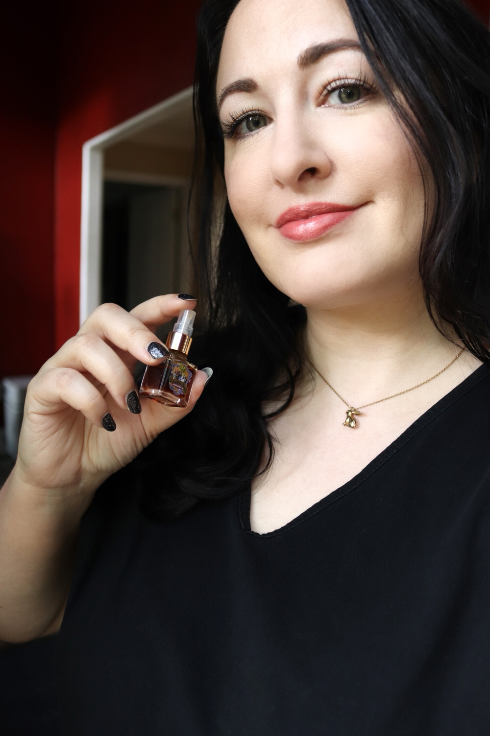 Jen wearing Pangolin Violette Rose cruelty free perfume by Velvet and Sweet Pea's Purrfumery