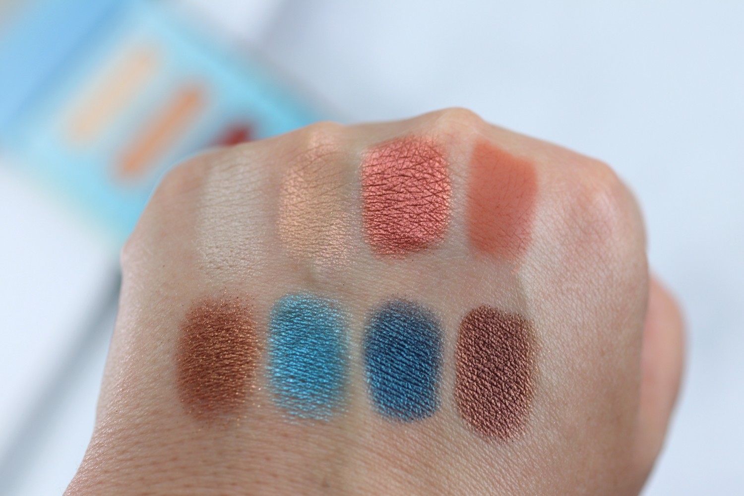 Urban Decay Beached Eyeshadow Palette Review and Swatches - Which Metallic Lipsticks Do You Like featured by popular Los Angeles cruelty free beauty blogger My Beauty Bunny